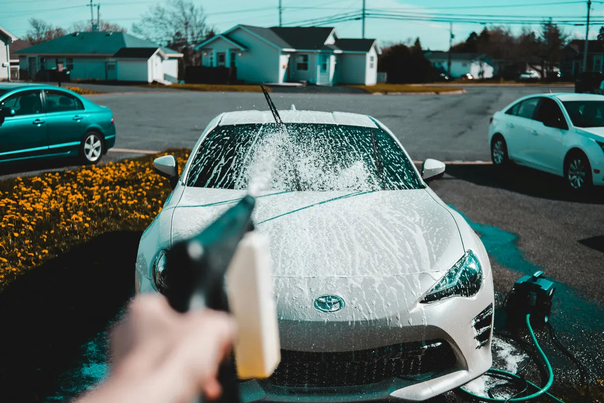 Detailing a car in the driveway