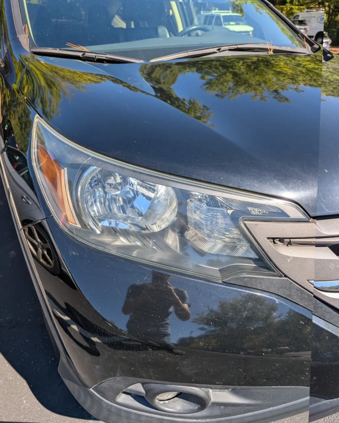 The same Honda headlight restored to crystal clear